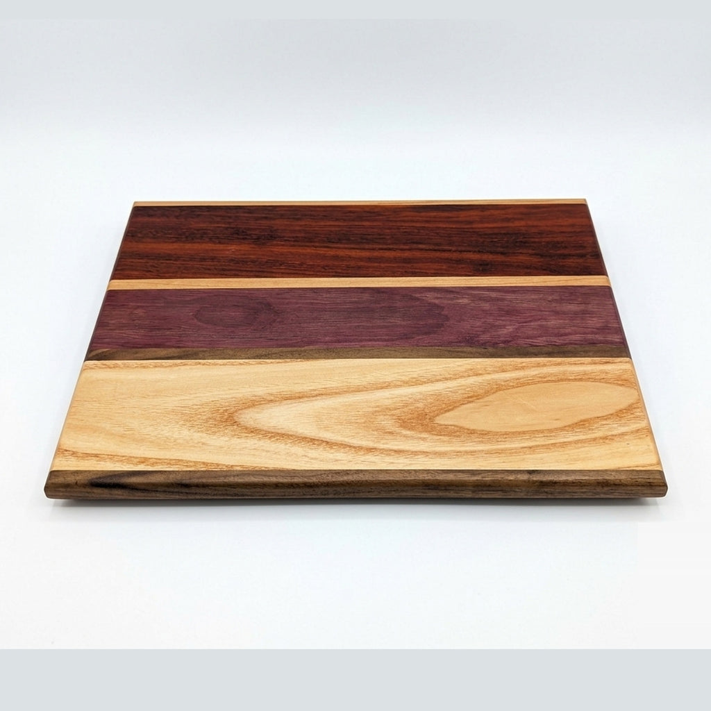 No. 308, "Linda" | Padauk, Purpleheart and Honey Locust Cutting Board