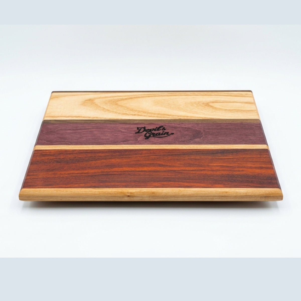 No. 308, "Linda" | Padauk, Purpleheart and Honey Locust Cutting Board